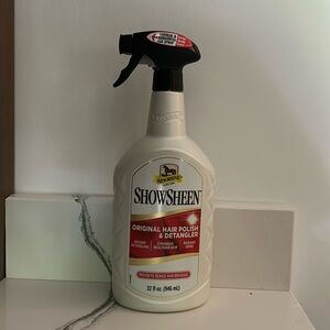 full  bottle of showsheen hair polish & detangler